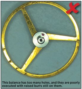 This balance has too many holes, and they are poorly executed with raised burrs still on them.
